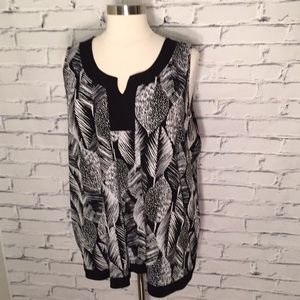 Black and white sleeveless blouse